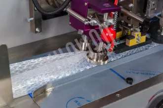 Автоматическая горизонтальная упаковочная машина HUALIAN DXDZ-350XD под ВПП (3 servo, рег. форм., трансп. попереч. запайки) - 4